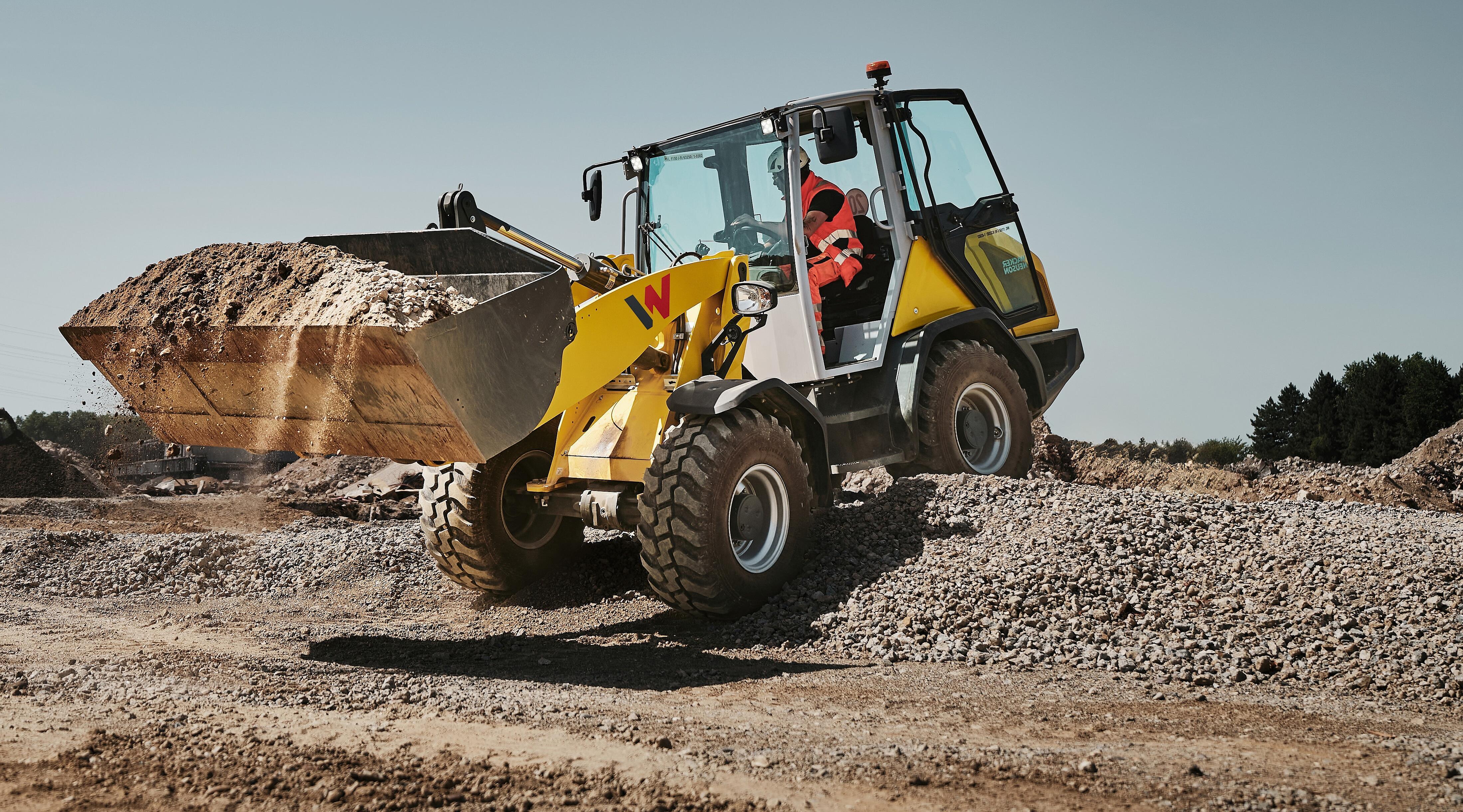 yellow wheel loader WL1150 in action